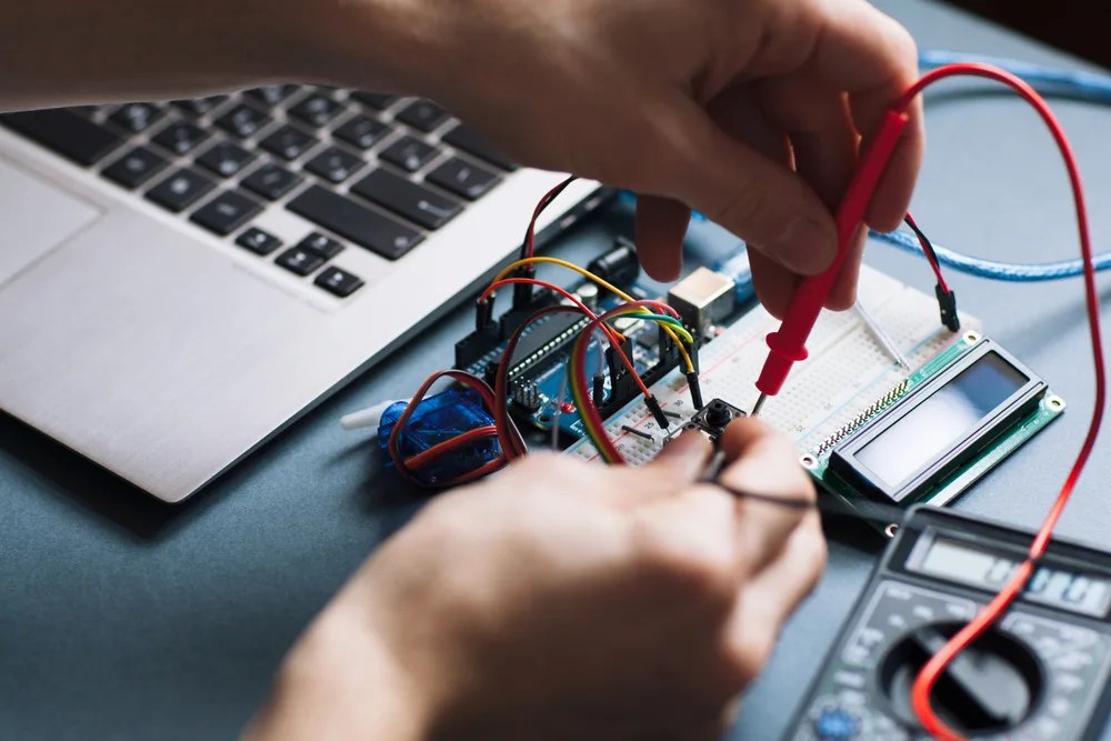 Engeneer hands working with computer elements.