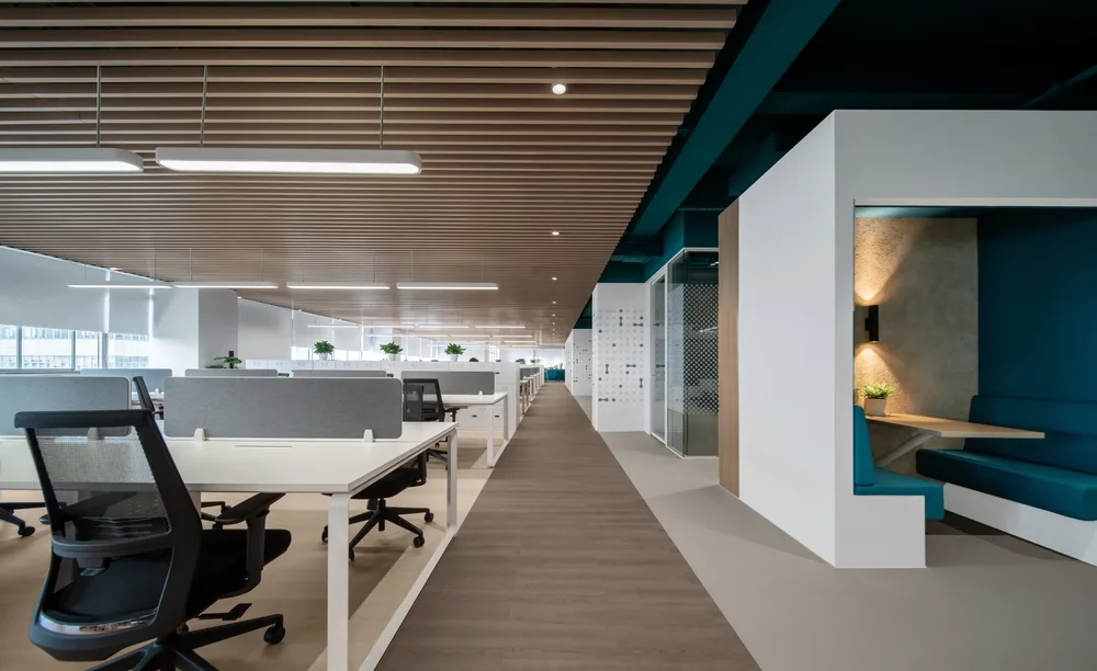 A,Modern,Office,Space,With,A,Green,And,Wood,Theme